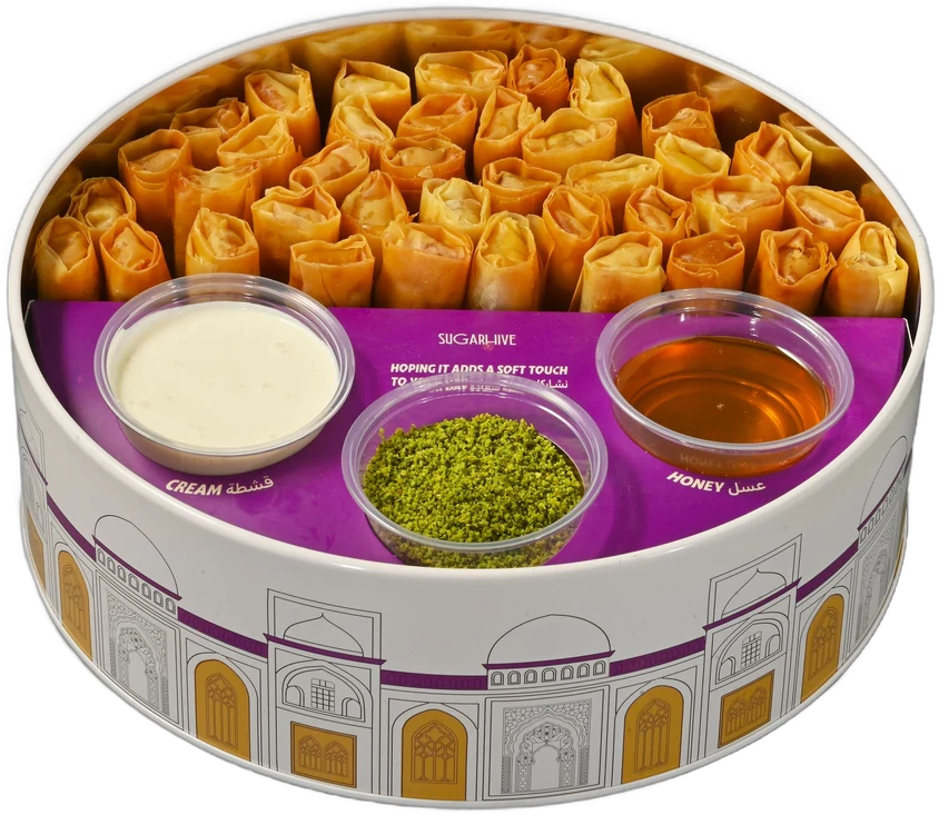 The Sugarhive baklava sticks box with its three dips